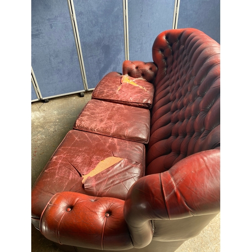 275 - Crimson Leather Chesterfield Three Seater sofa

Dimensions - 36