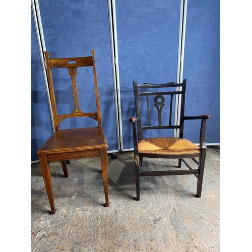 498 - Two antique chairs - One rush seated armchair and one dining chair.

See images for dimensions.