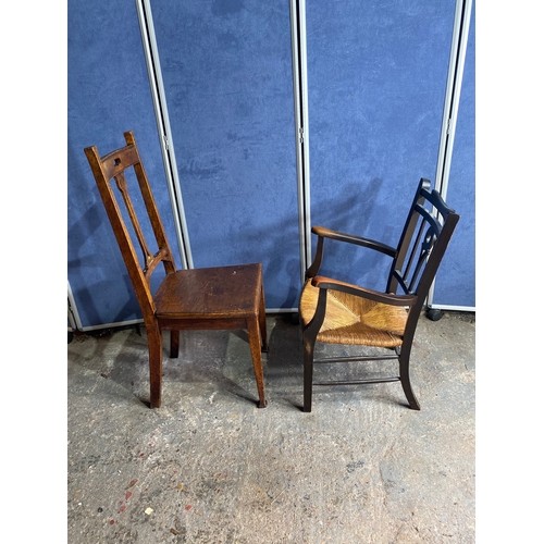 498 - Two antique chairs - One rush seated armchair and one dining chair.

See images for dimensions.