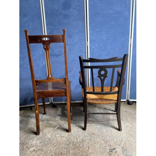 498 - Two antique chairs - One rush seated armchair and one dining chair.

See images for dimensions.