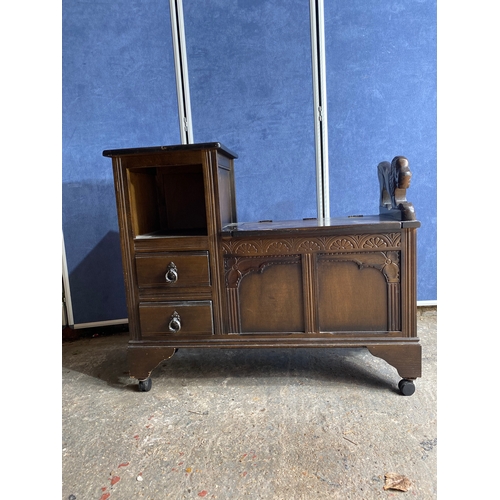 503 - Vintage Oak Telephone bench / Settle with Lion carving on wheels.

Dimensions -  35