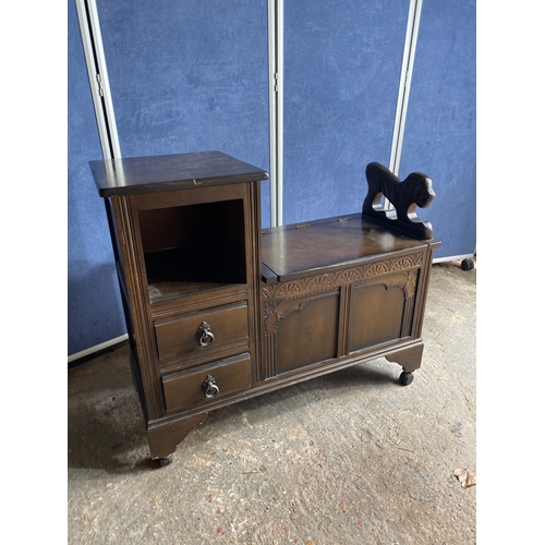 503 - Vintage Oak Telephone bench / Settle with Lion carving on wheels.

Dimensions -  35