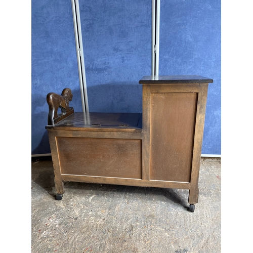 503 - Vintage Oak Telephone bench / Settle with Lion carving on wheels.

Dimensions -  35