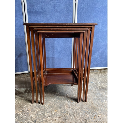 506 - Antique mahogany Inlaid nest of four tables.

Dimensions of largest for reference - 20