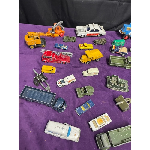 25 - Quantity of vintage played with Corgi / Dinky toys vehicles / Military