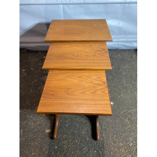 210A - Mid Century Teak G Plan Nest of three tables. 

Dimension of biggest table - 22