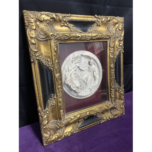 151 - A Framed Victorian High Relief Marble circular panel depicting two allegorical figures on a leaf and... 