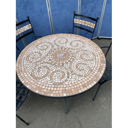 225 - Metal garden table and four stackable chairs with tiled mosaic design. 

See images for dimensions.