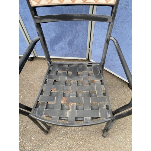 225 - Metal garden table and four stackable chairs with tiled mosaic design. 

See images for dimensions.