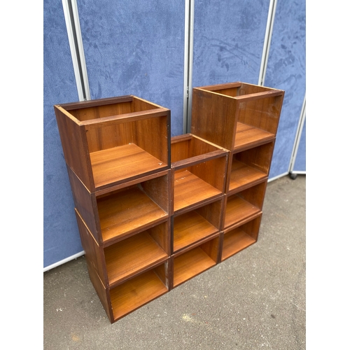 227 - Eleven stackable/changeable teak shelving boxes.

Dimensions in images are for each box.