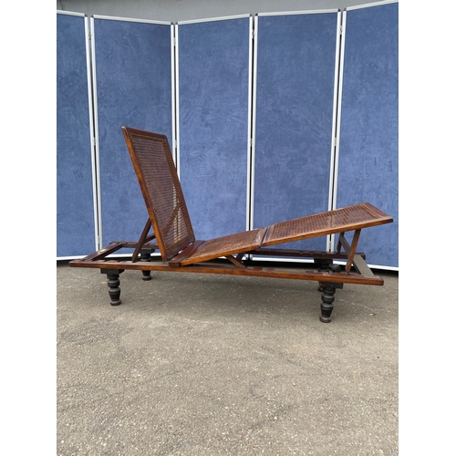 243 - Antique english Victorian folding campaign daybed by Leveson & Sons. Mahogany framed with woven cane... 