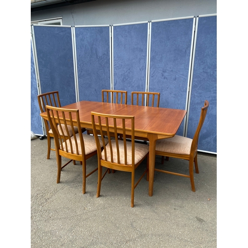 250 - 1960's teak McIntosh retractable/extendable dining table and six chairs. 

Please see images for dim... 