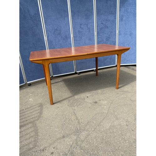 250 - 1960's teak McIntosh retractable/extendable dining table and six chairs. 

Please see images for dim... 