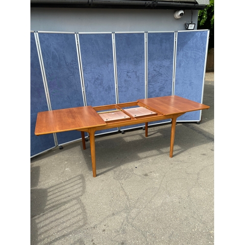 250 - 1960's teak McIntosh retractable/extendable dining table and six chairs. 

Please see images for dim... 