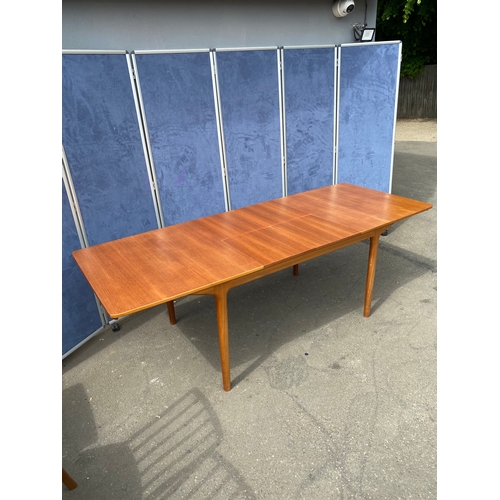 250 - 1960's teak McIntosh retractable/extendable dining table and six chairs. 

Please see images for dim... 