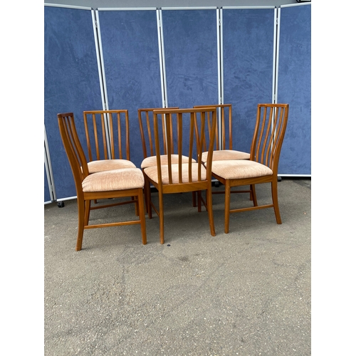 250 - 1960's teak McIntosh retractable/extendable dining table and six chairs. 

Please see images for dim... 