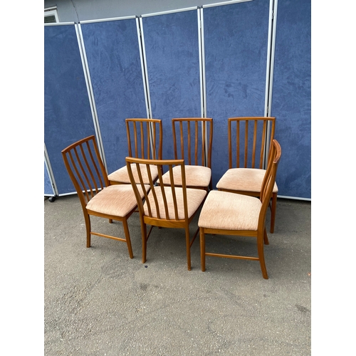 250 - 1960's teak McIntosh retractable/extendable dining table and six chairs. 

Please see images for dim... 