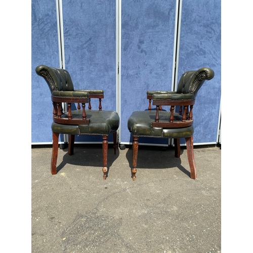 257 - A lot of two matching Vintage green leather button back captains office/library chairs

Please see i... 