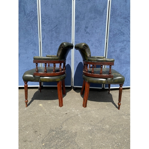 257 - A lot of two matching Vintage green leather button back captains office/library chairs

Please see i... 