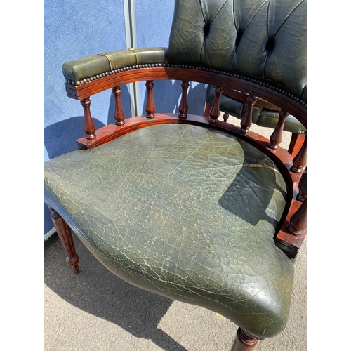 257 - A lot of two matching Vintage green leather button back captains office/library chairs

Please see i... 