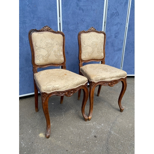 260 - A pair of 19th century carved walnut side chairs by Von Hundelshausen