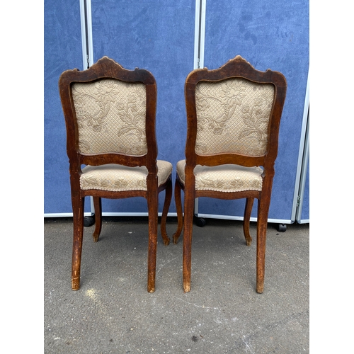 260 - A pair of 19th century carved walnut side chairs by Von Hundelshausen