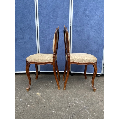 260 - A pair of 19th century carved walnut side chairs by Von Hundelshausen