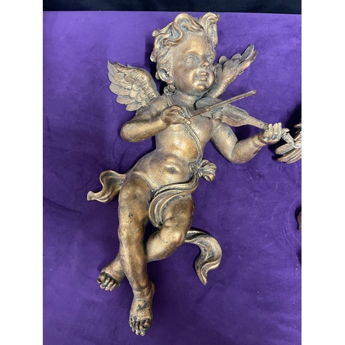 56 - Pair of gilded resin cherubs wall hangings 40cm