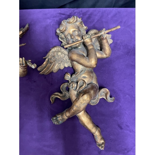 56 - Pair of gilded resin cherubs wall hangings 40cm