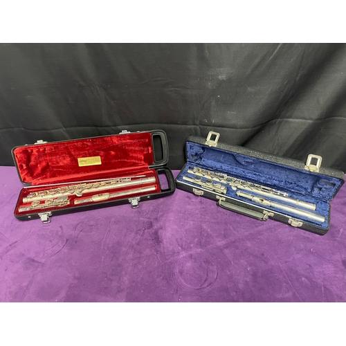 58 - Two cased flutes 
Yamaha YFL 221S / Sapphire by Rosetti London