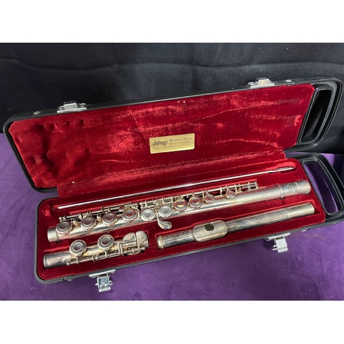 58 - Two cased flutes 
Yamaha YFL 221S / Sapphire by Rosetti London