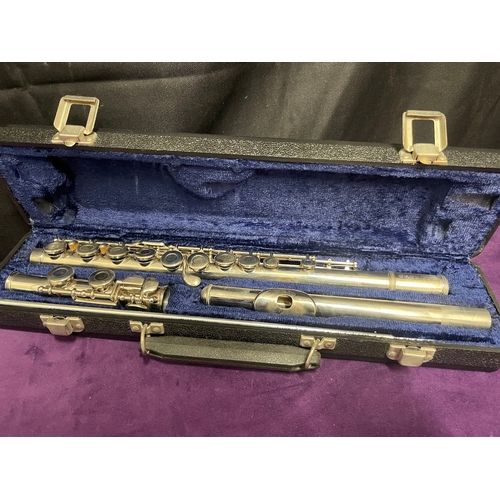 58 - Two cased flutes 
Yamaha YFL 221S / Sapphire by Rosetti London