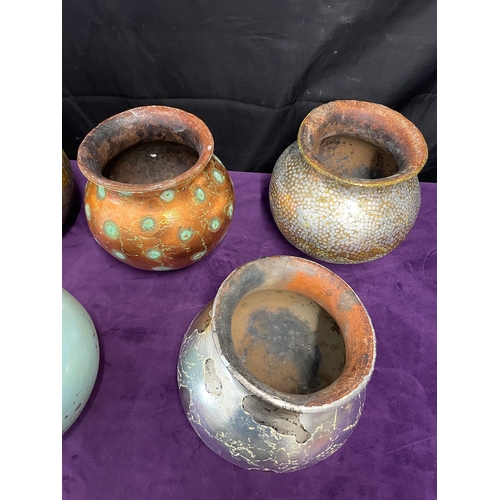 69 - Five Vintage Terracotta Bowls hand-painted in contemporary silver, gold , copper designs