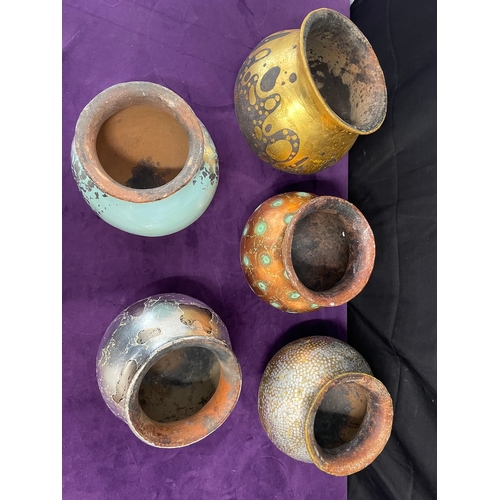 69 - Five Vintage Terracotta Bowls hand-painted in contemporary silver, gold , copper designs