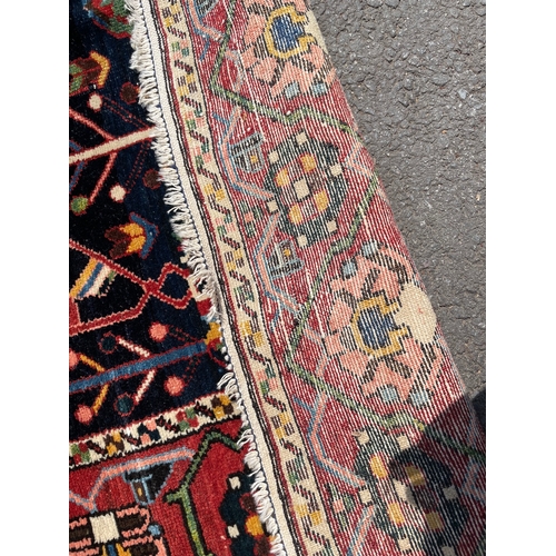 81 - Persian Rug 144cm x 207cm