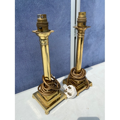 296 - Two Decor brass column style table lamps