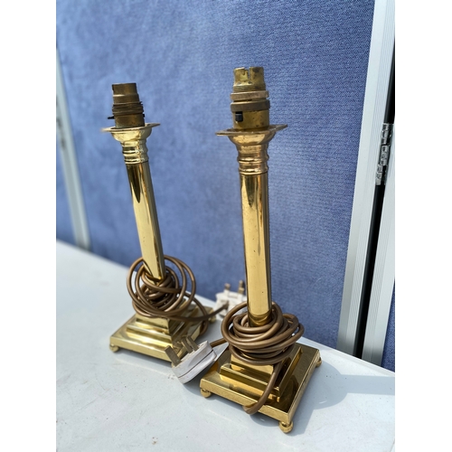 296 - Two Decor brass column style table lamps