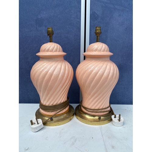 297 - Two Vintage regency style ceramic swirl pink table lamps