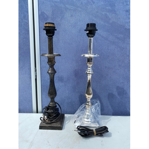 298 - Two candle stick design table lamps.

**Two prong plug**