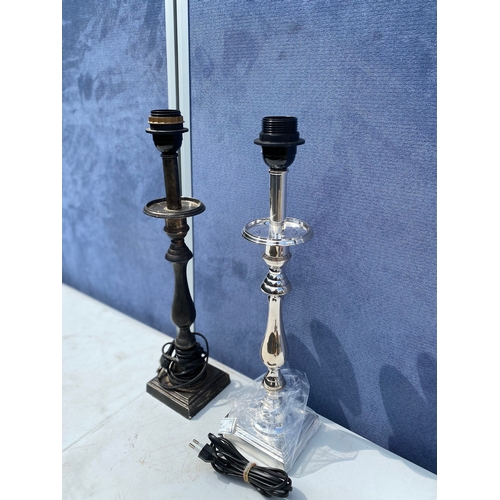 298 - Two candle stick design table lamps.

**Two prong plug**