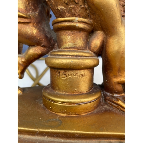 301 - Vintage A Santini cherub sculpture design table lamp.