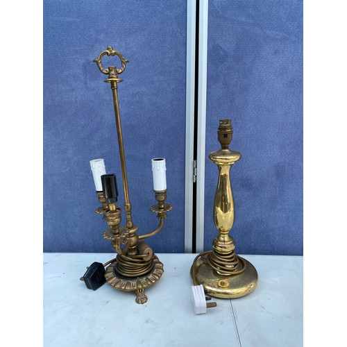 302 - Two miscellaneous brass table lamps.