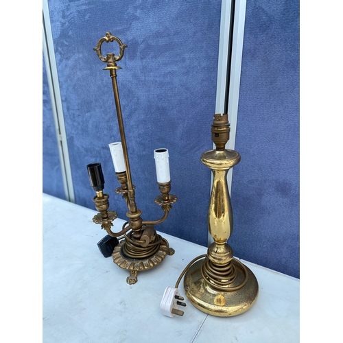 302 - Two miscellaneous brass table lamps.