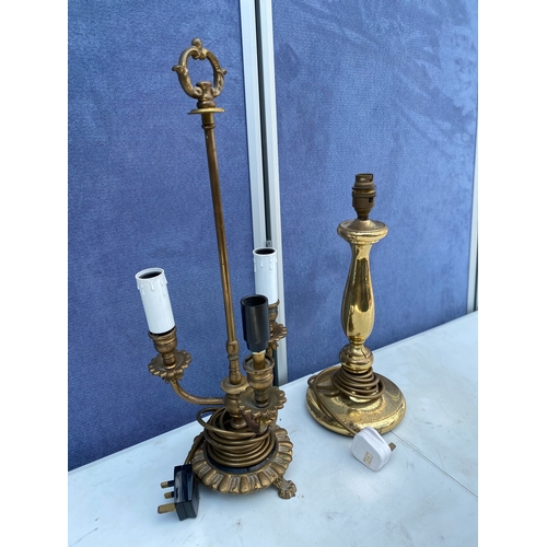 302 - Two miscellaneous brass table lamps.