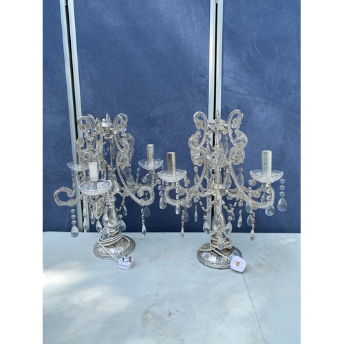 304 - A pair of chandelier style bedside/table top lamps.