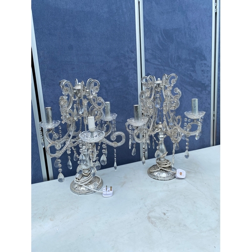 304 - A pair of chandelier style bedside/table top lamps.