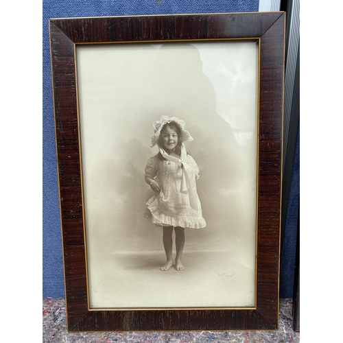 340 - A selection of old signed photographs of young girls.