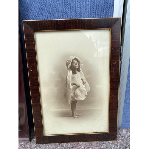 340 - A selection of old signed photographs of young girls.