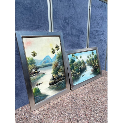 374 - Two signed Vietnamese landscape paintings on board by  Dao Hai Phong