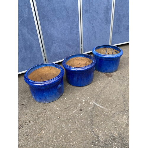 390 - A lot of three blue glazed plant pots